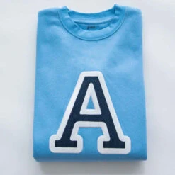 Sudadera Iniciales Celeste -Roly Sudadera Iniciales Celeste 4