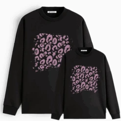 Sudadera Chic Animal Print -Roly Sudadera chic animal print negra